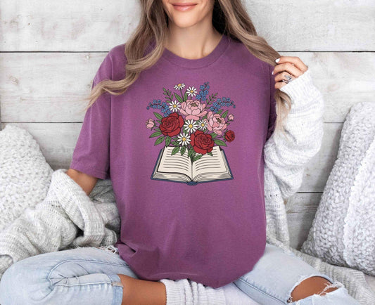 A comfort colors® shirt with the saying "flowered book"