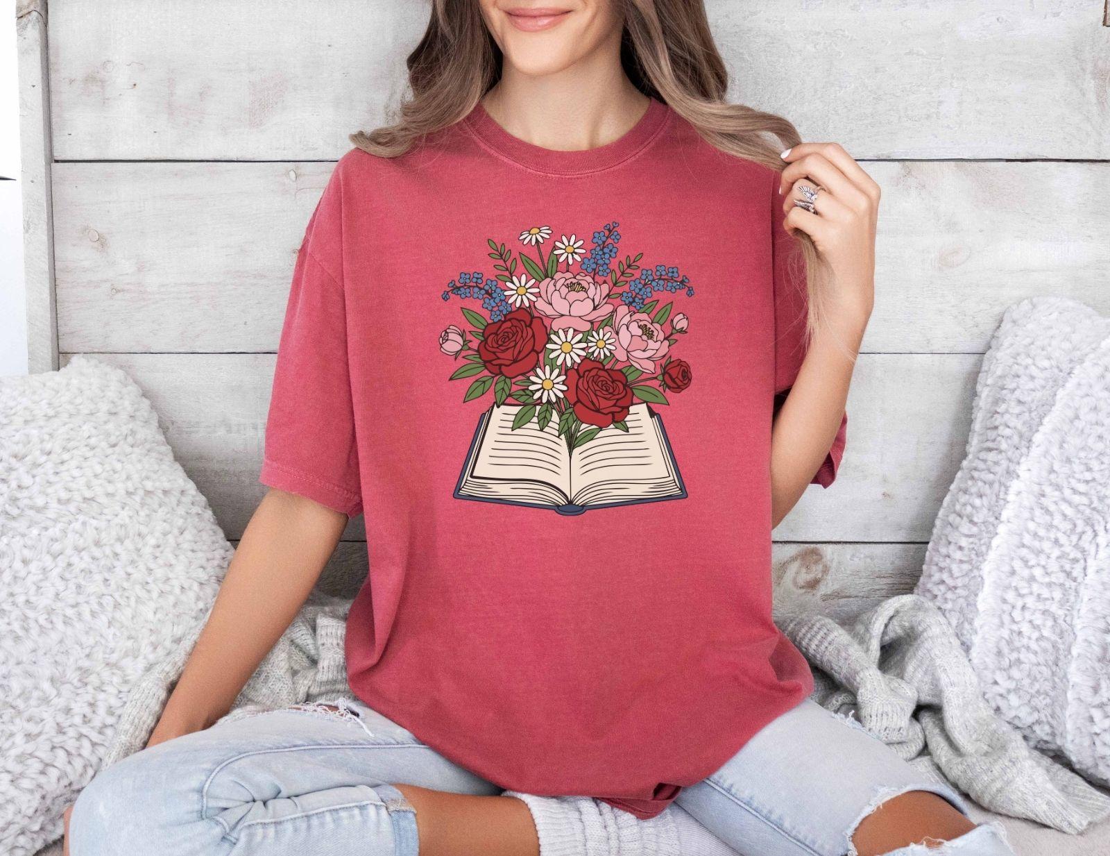 A comfort colors® shirt with the saying "flowered book"