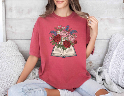 A comfort colors® shirt with the saying "flowered book"