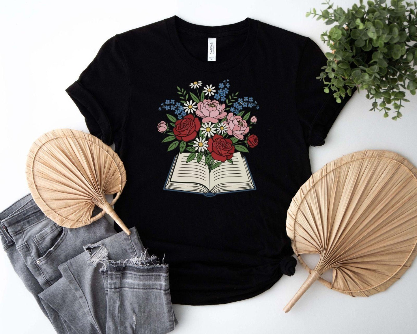 A comfort colors® shirt with the saying "flowered book"