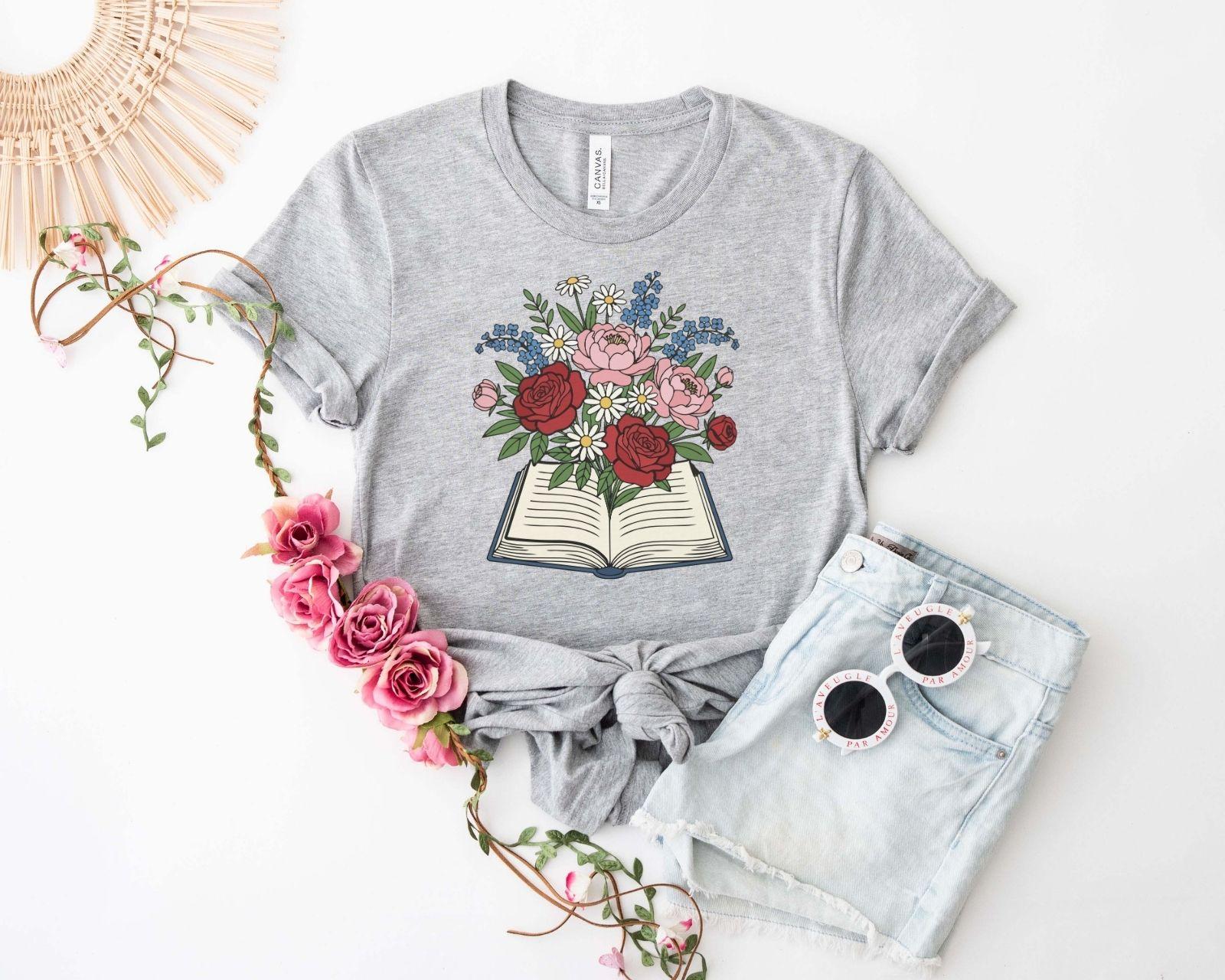 A comfort colors® shirt with the saying "flowered book"