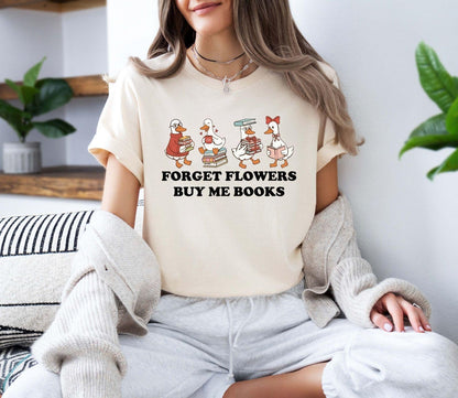 A gildan 18000 sweatshirt with the saying "Forget flowers buy me books"