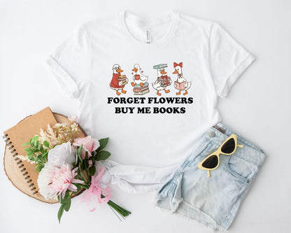 A gildan 18000 sweatshirt with the saying "Forget flowers buy me books"