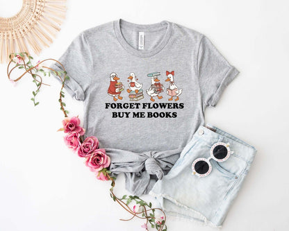 A gildan 18000 sweatshirt with the saying "Forget flowers buy me books"