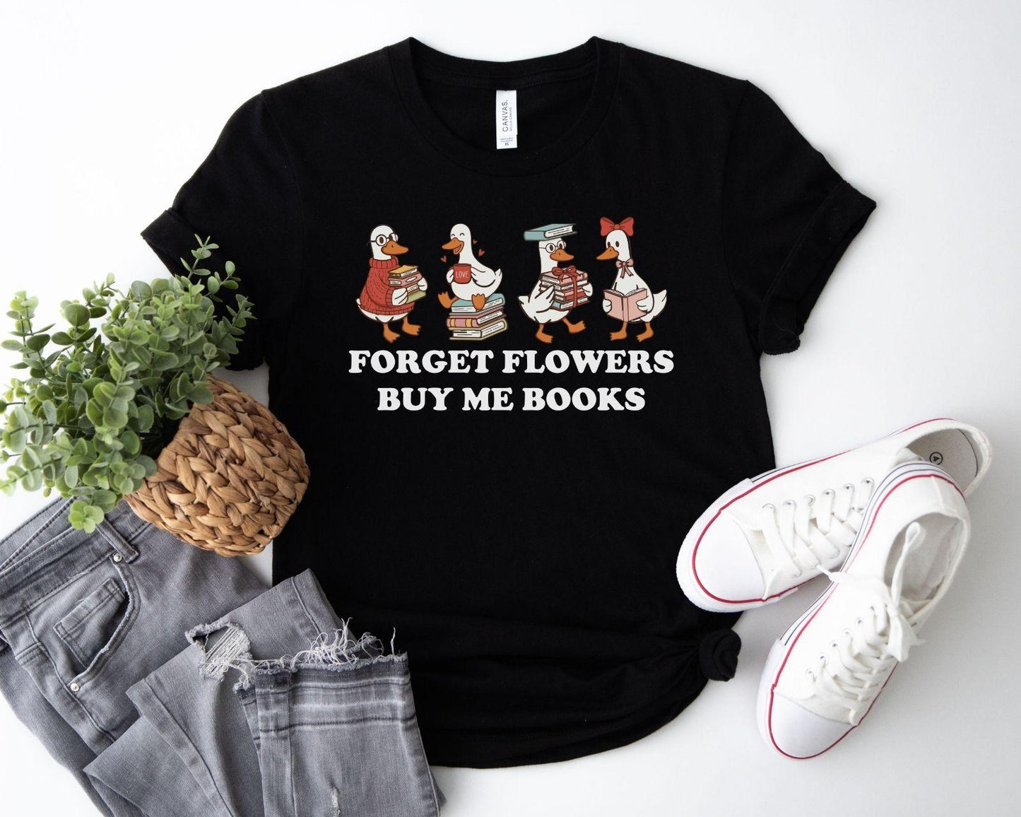 A gildan 18000 sweatshirt with the saying "Forget flowers buy me books"