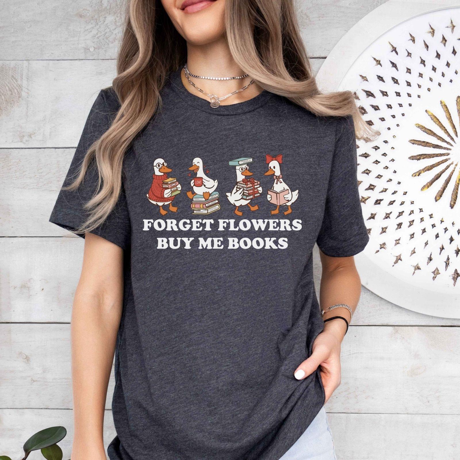 A gildan 18000 sweatshirt with the saying "Forget flowers buy me books"
