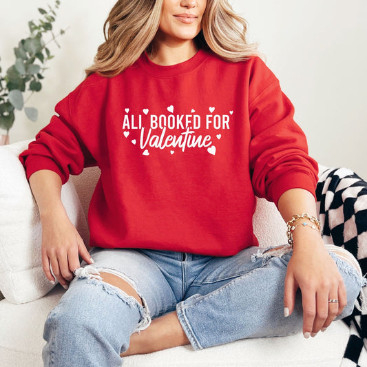 A red color sweatshirt with the saying "All booked for valentine"