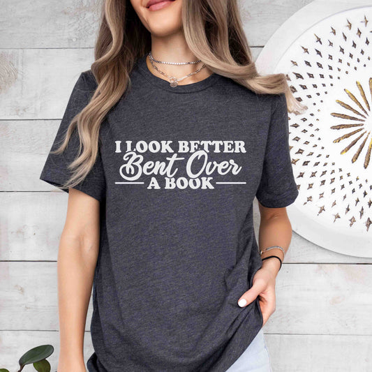 A dark grey heather color with the saying "I look better bent over"