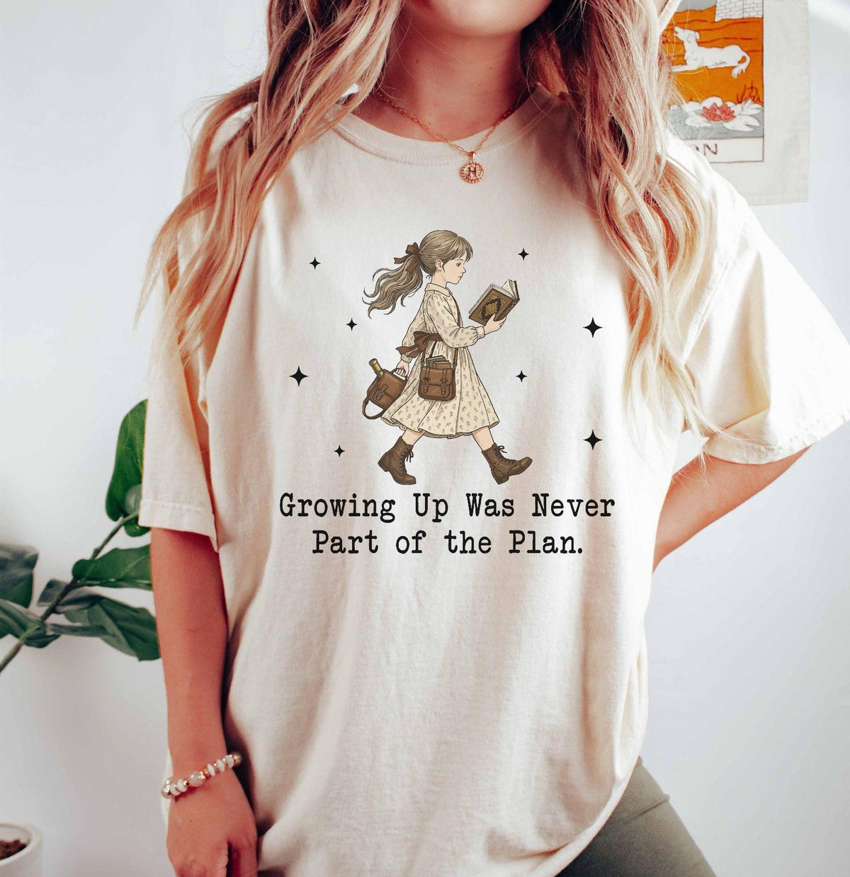 A comfort colors® shirt with the saying "Growing Up Was Never Part of the Plan "
