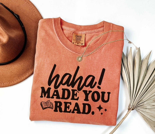 A comfort colors® shirt with the saying "Haha made you read"