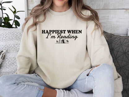 A Gildan 18000 sweatshirt with the saying "Happiest when I'm reading"
