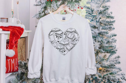A Gildan 18000 sweatshirt with the saying "heart made of books"