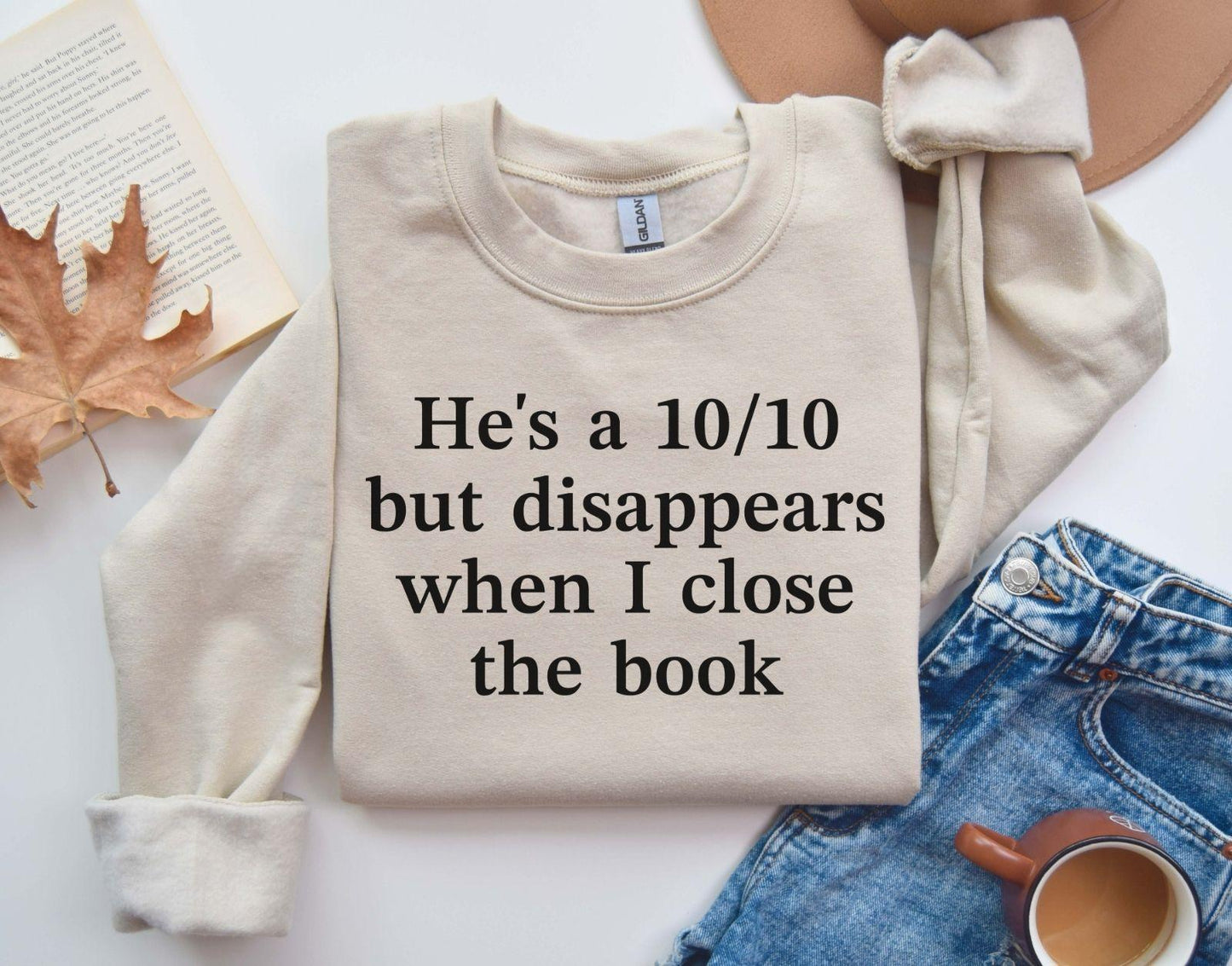 A Gildan 18000 sweatshirt with the saying "he's a 10/10 but disappears when i close the book"