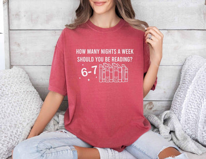 A comfort colors shirt with the saying " How Many Nights A Week Should You Be Reading 6-7"