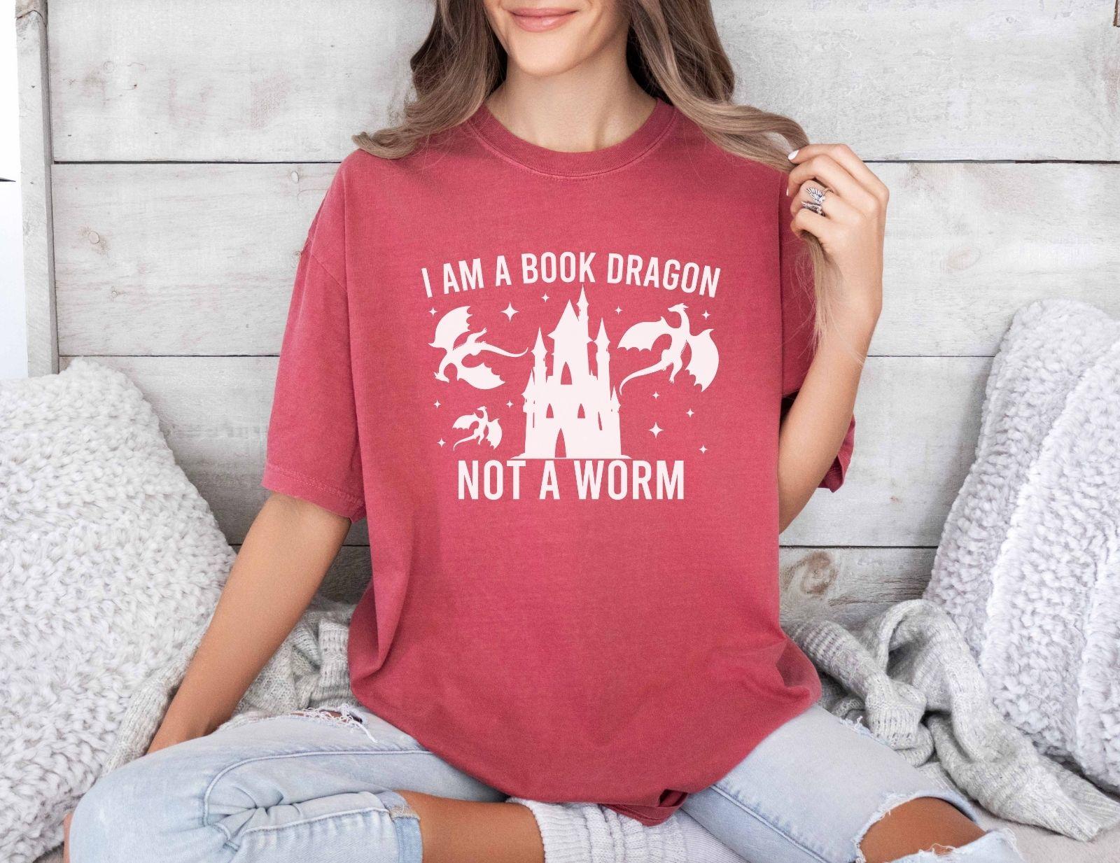 A comfort colors shirt with the saying "I am a book dragon not a work"