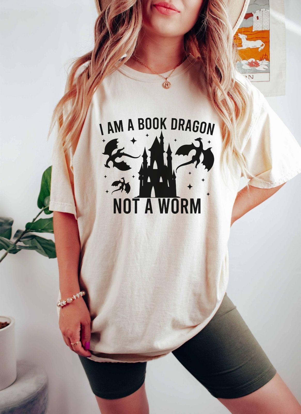 A comfort colors shirt with the saying "I am a book dragon not a work"
