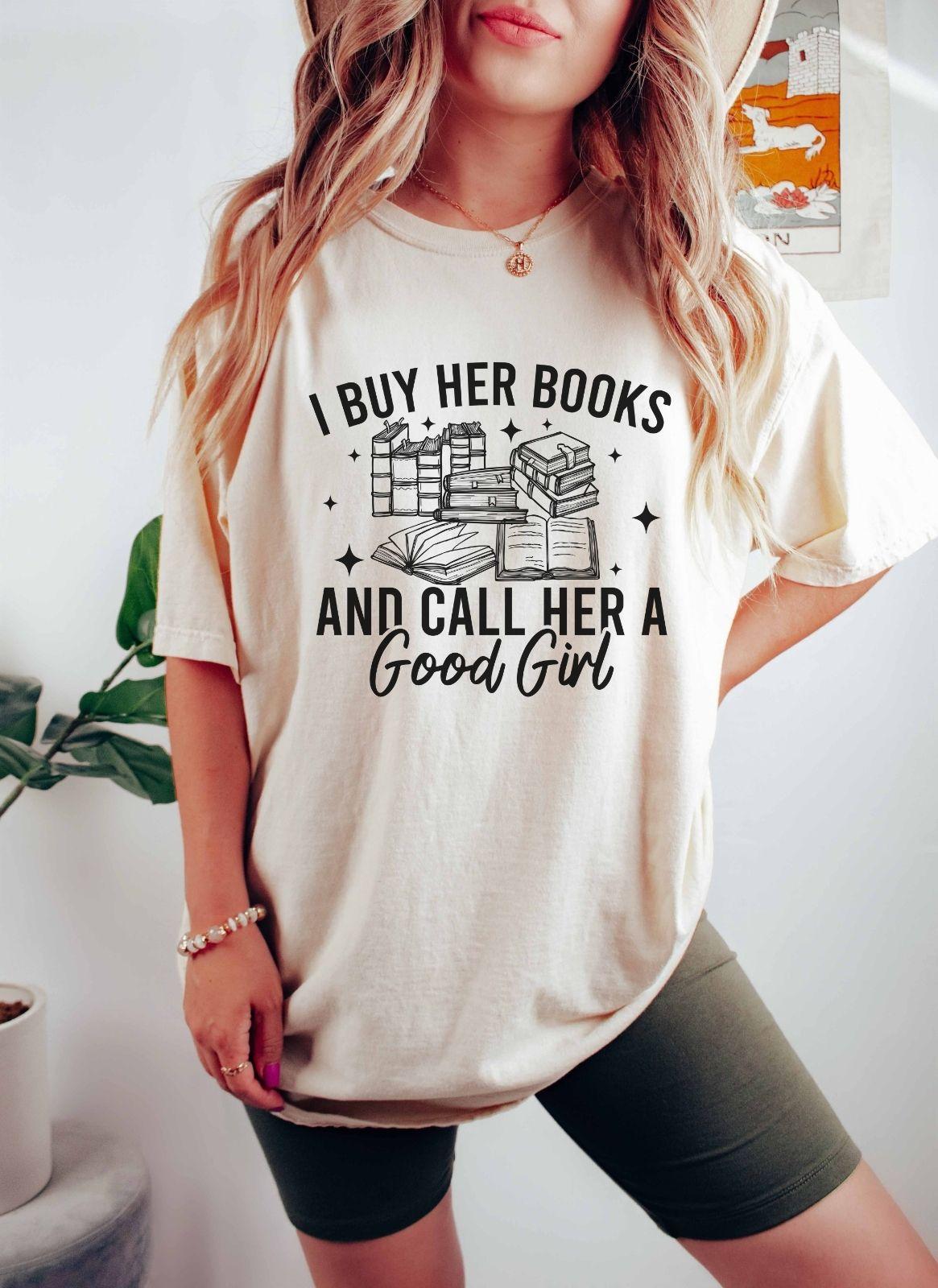A comfort colors shirt with the saying "I buy her books and call her a good girl"