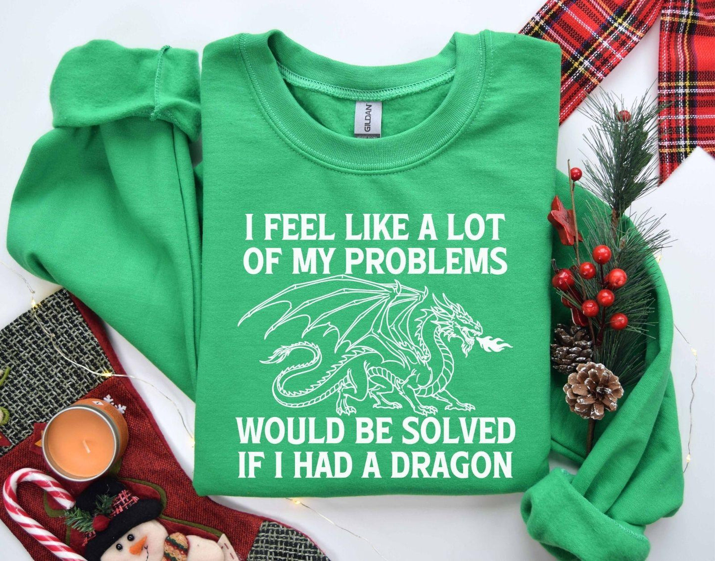 A Gildan 18000 sweatshirt with the saying "I feel like a lot of my problems would be solved if I had a dragon"