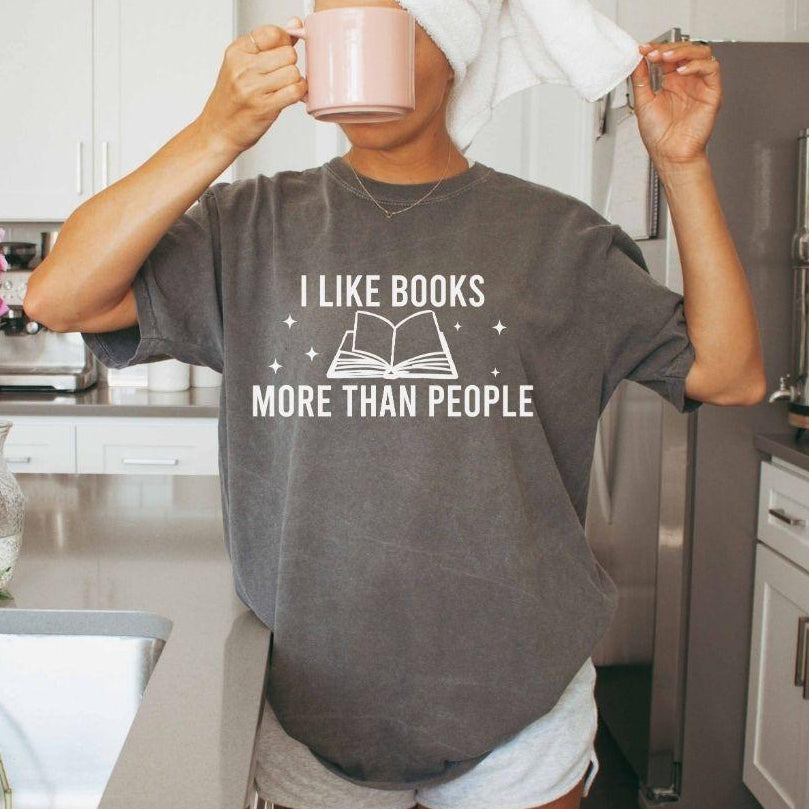 A comfort colors® shirt with the saying "I like books more than people"