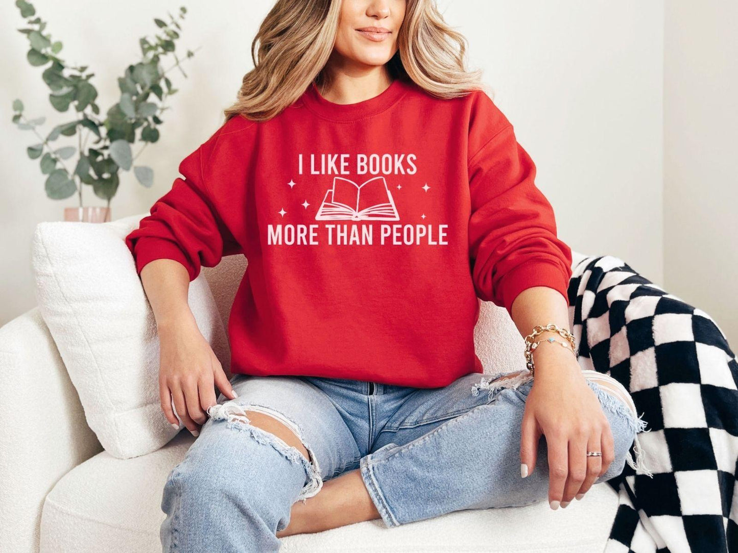A Gildan 18000 sweatshirt with the saying "I like books more than people"