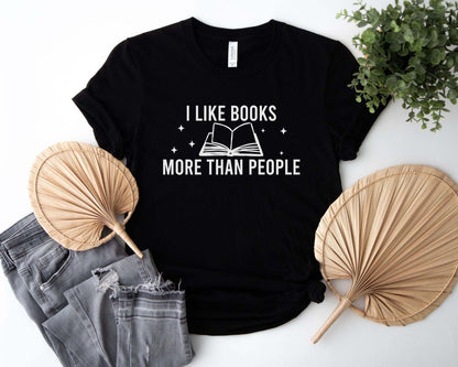 A comfort colors® shirt with the saying "I like books more than people"