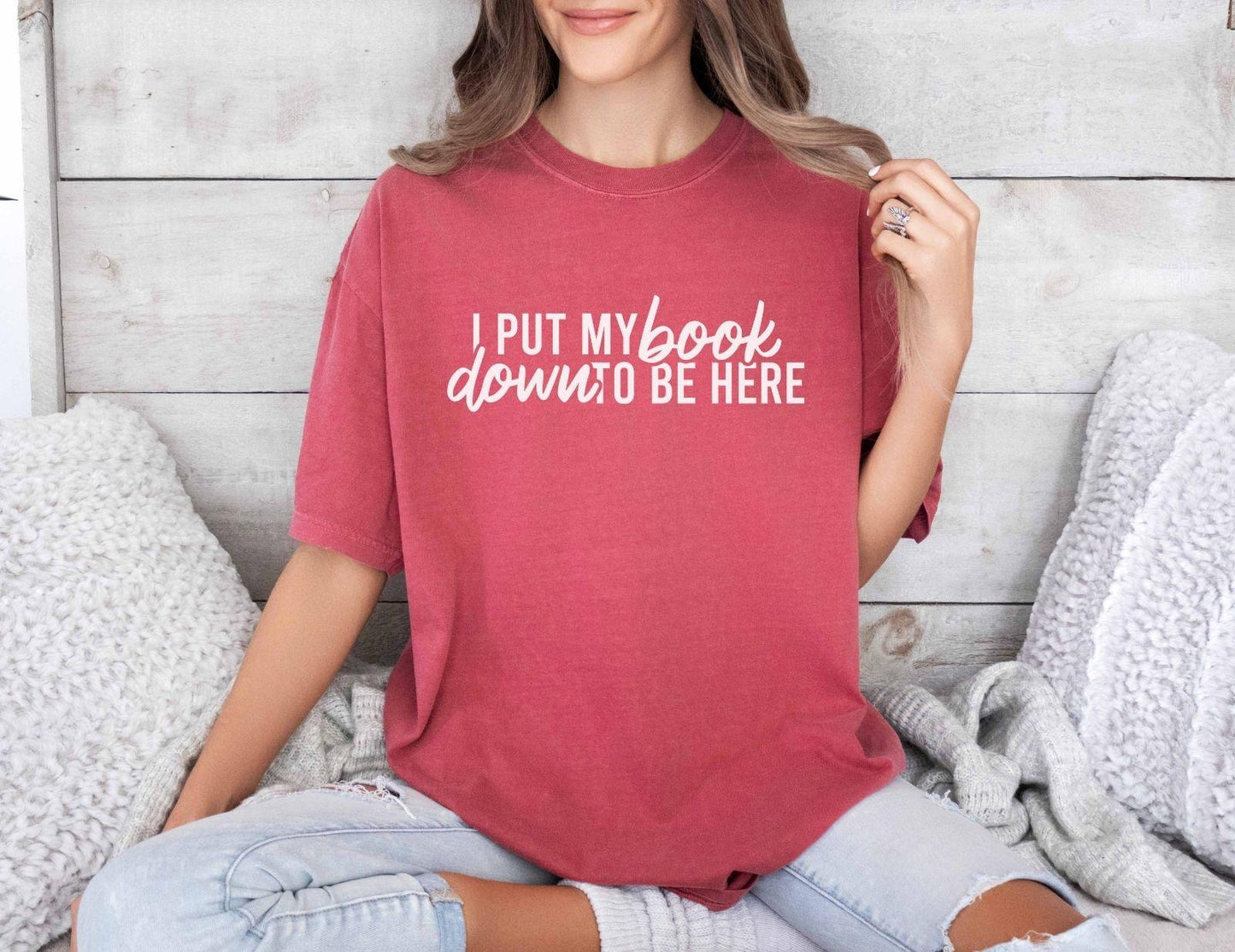 A comfort colors® shirt with the saying "I put my book down to be here"