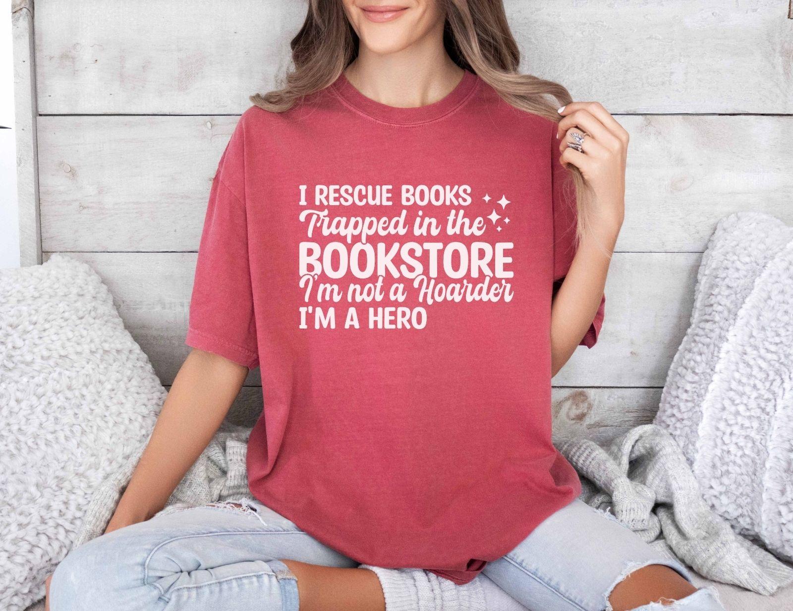 A comfort colors® shirt with the saying "I Rescue Books Trapped In The Bookstore"