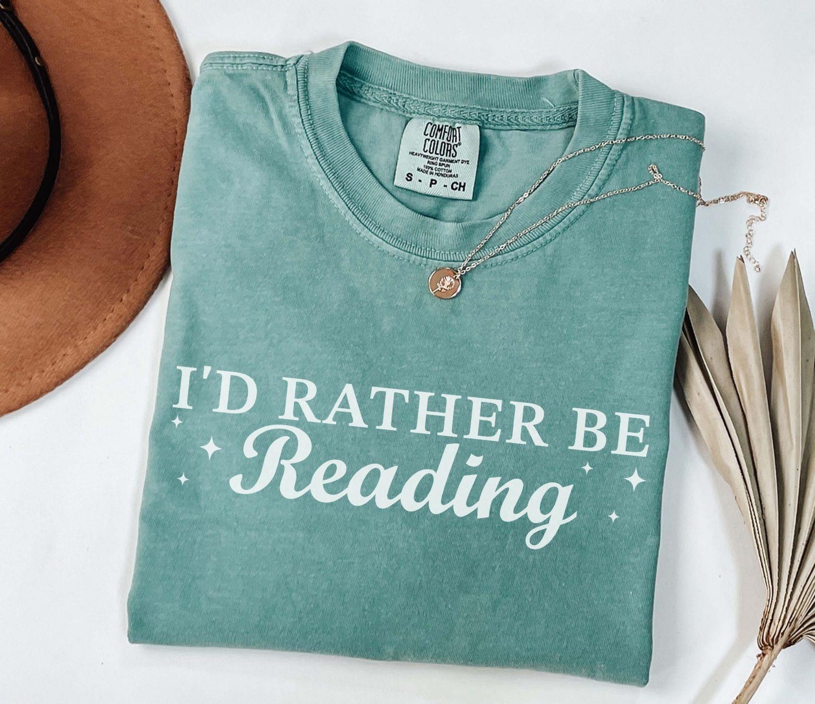 A comfort colors® shirt with the saying "I'd rather be reading"