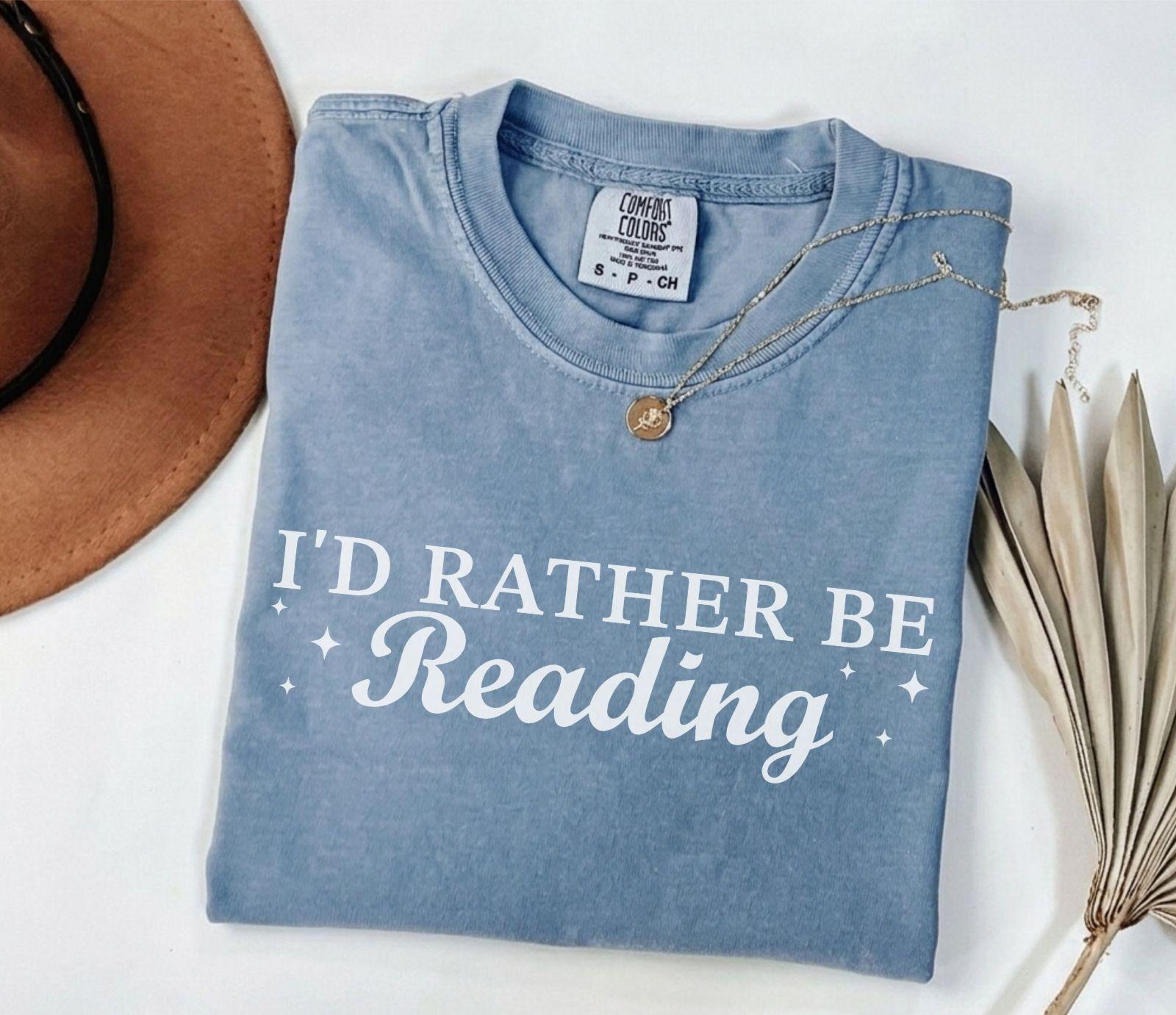 A comfort colors® shirt with the saying "I'd rather be reading"