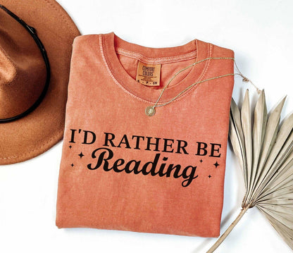A comfort colors® shirt with the saying "I'd rather be reading"