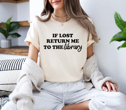 A comfort colors® shirt with the saying "if lost return me to the library"