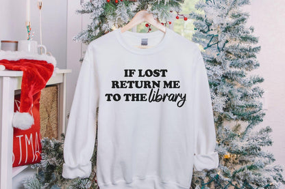 A Gildan 18000 sweatshirt with the saying "if lost return me to the library"