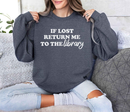 A Gildan 18000 sweatshirt with the saying "if lost return me to the library"