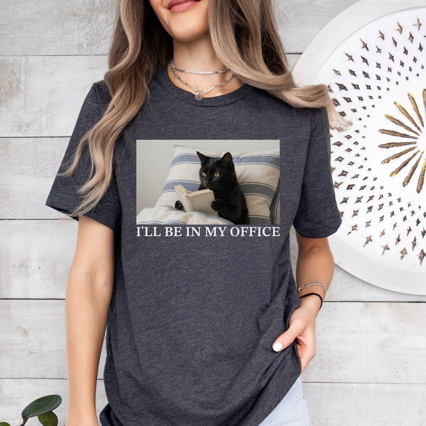 A bella canvas 3001 shirt with the saying "I'll be in my office"