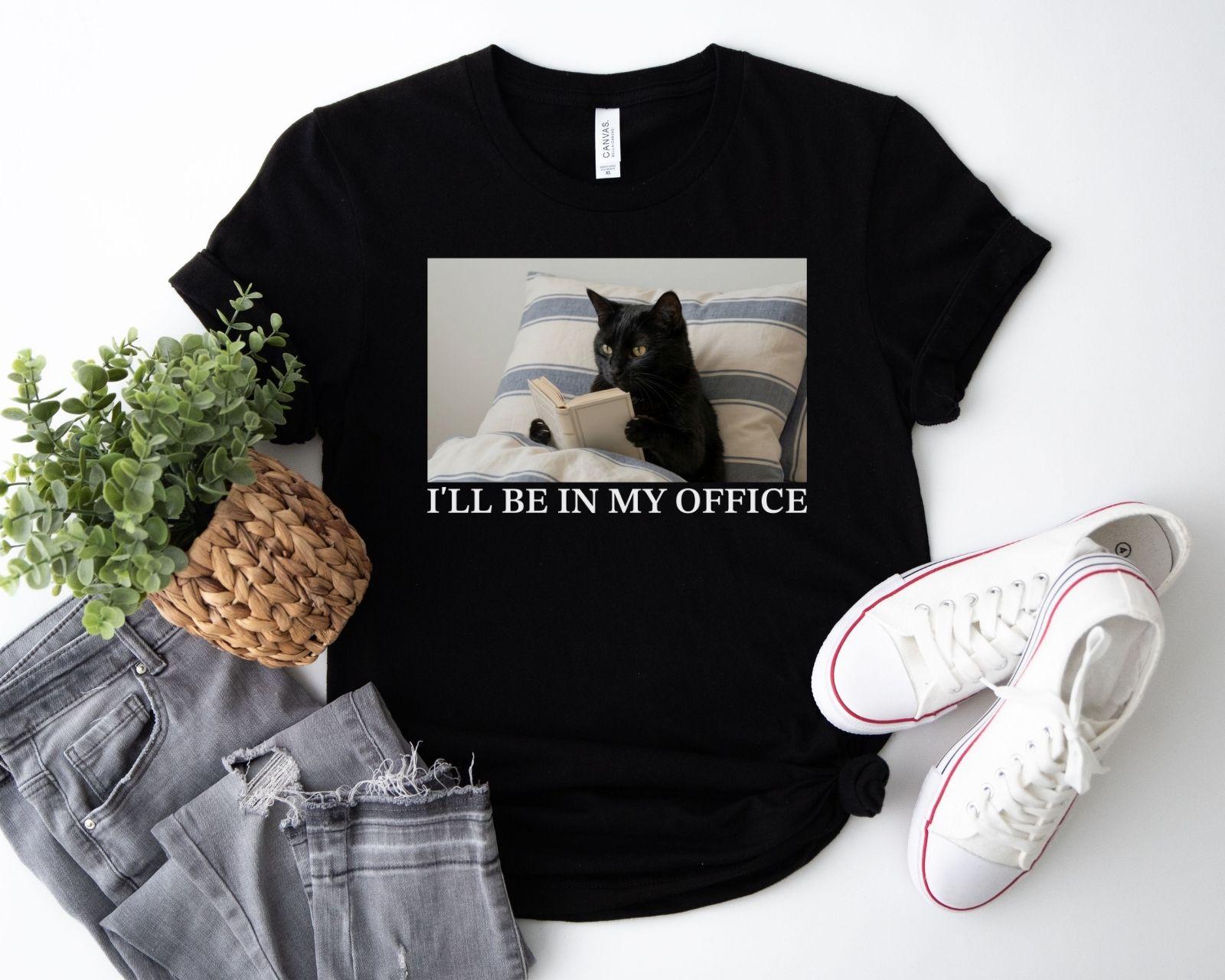 A bella canvas 3001 shirt with the saying "I'll be in my office"