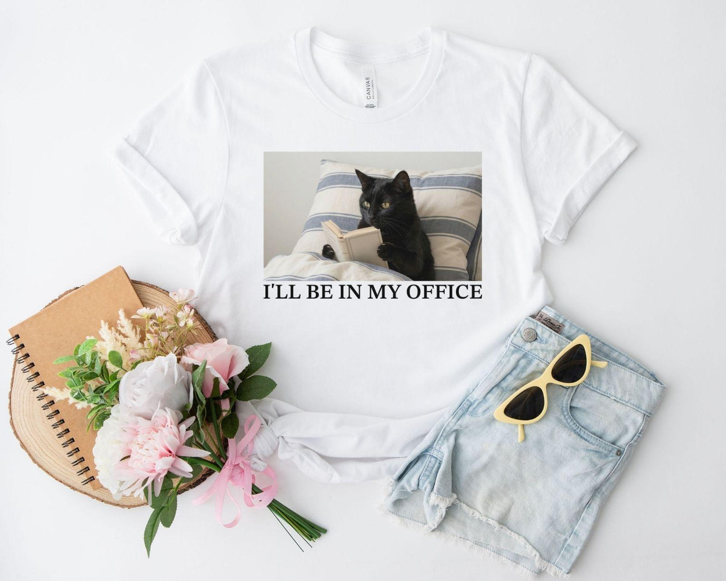 A bella canvas 3001 shirt with the saying "I'll be in my office"