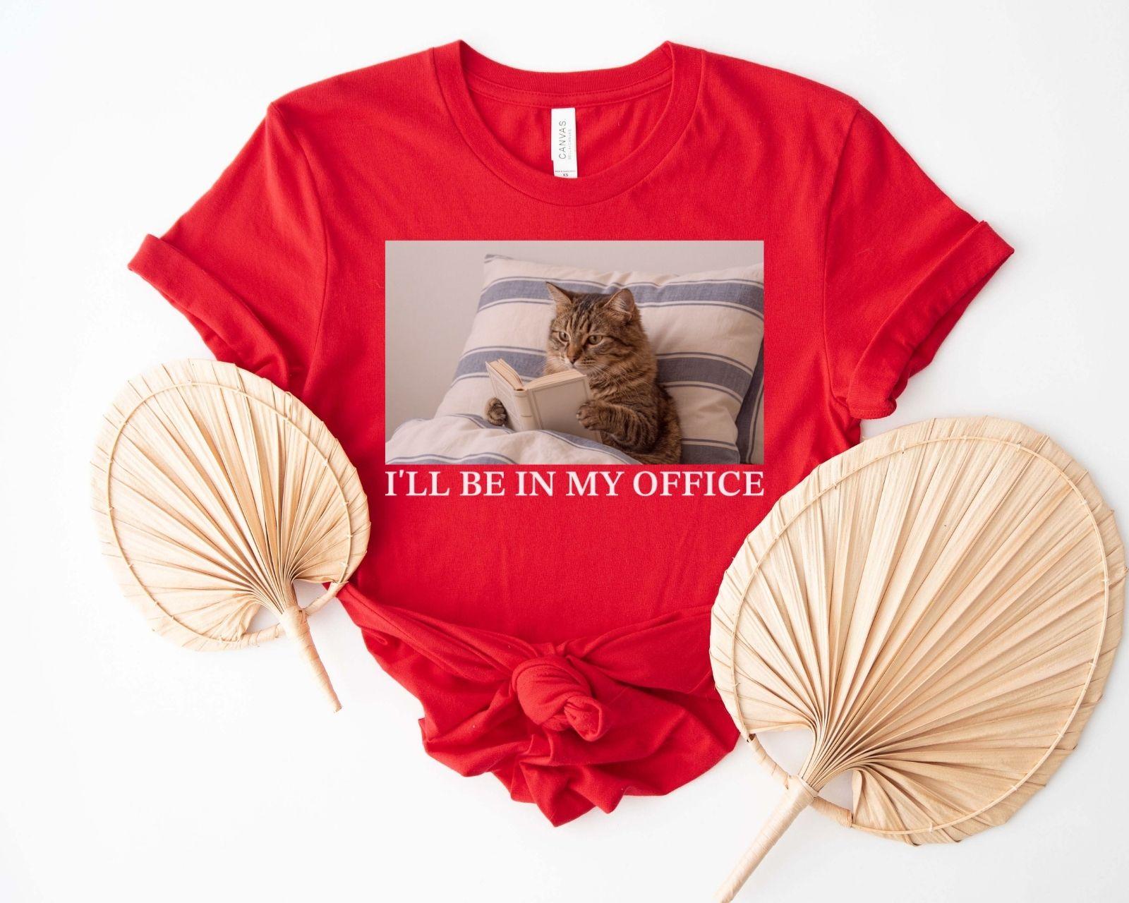 A bella canvas 3001 shirt with the saying "I'll be in my office"
