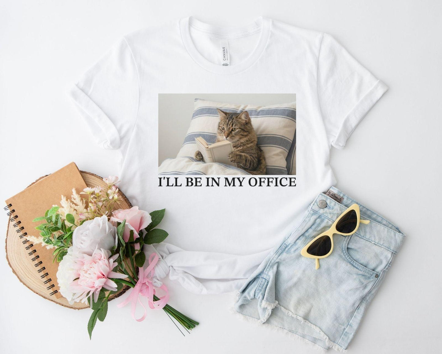 A bella canvas 3001 shirt with the saying "I'll be in my office"
