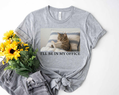 A bella canvas 3001 shirt with the saying "I'll be in my office"