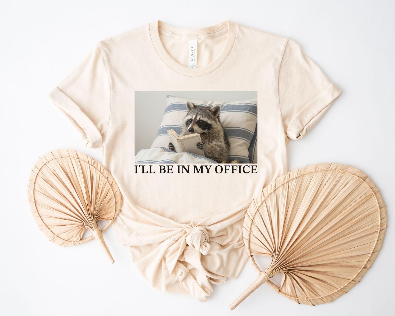 A bella canvas 3001 shirt with the saying "I'll be in my office"