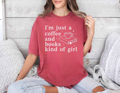 A comfort colors® shirt with the saying "I'm just a coffee and books kind of girl"