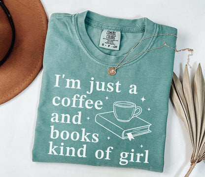 A comfort colors® shirt with the saying "I'm just a coffee and books kind of girl"