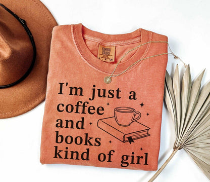 A comfort colors® shirt with the saying "I'm just a coffee and books kind of girl"