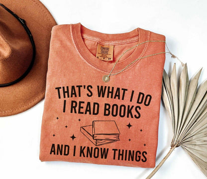 A comfort colors® shirt with the saying "That's what I do I read books and I know things"
