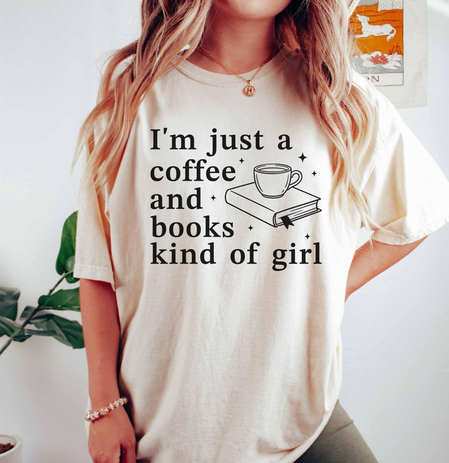 A comfort colors® shirt with the saying "I'm just a coffee and books kind of girl"