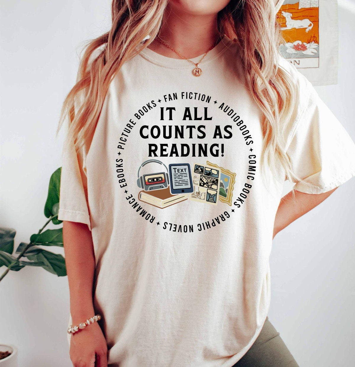 A comfort colors® shirt with the saying "it all counts as reading"