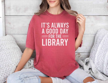 A comfort colors® shirt with the saying "It's always a good day for the library"