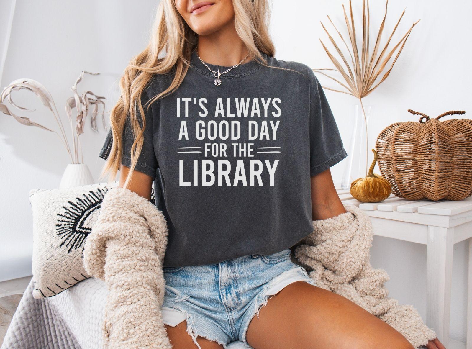 A comfort colors® shirt with the saying "It's always a good day for the library"