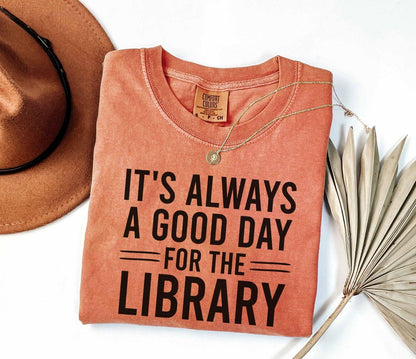 A comfort colors® shirt with the saying "It's always a good day for the library"