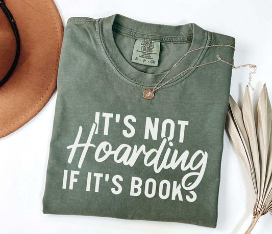 A comfort colors® shirt with the saying "It's not hoarding if it's books"